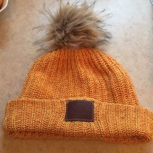 Love Your Melon cuffed beanie with pom